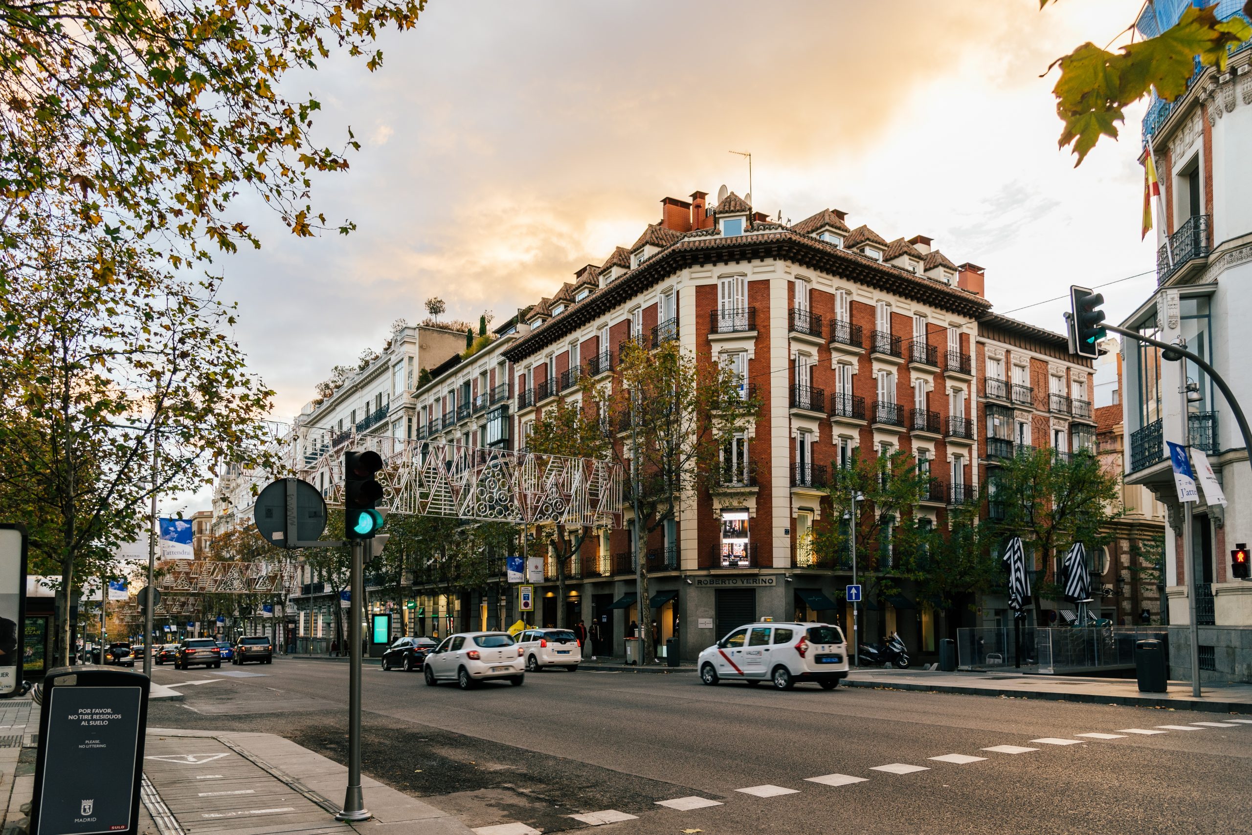 Madrid, Spain - December 6, 2020: Scenic view of Serrano Street in Salamanca District. It is a famous shopping area with luxury fashion stores
